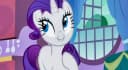 An elegant cartoon of Rarity adjusting a couture gown in a sunlit atelier filled with fabric rolls