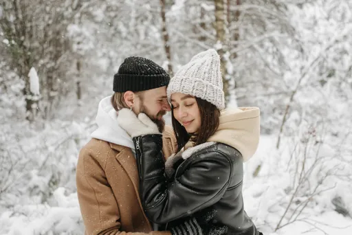 Cartoon couple embracing with wide eyes and soft blushes in a dreamy, romantic scene